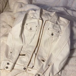 White jean jacket with tan trim